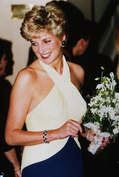 Diana, Princess of Wales, wearing a two tone halter neck dress, backstage at the Royal Opera House i...