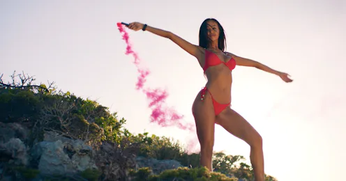 Cast member, Tabitha Clift announcing her arrival with a smoke flare.