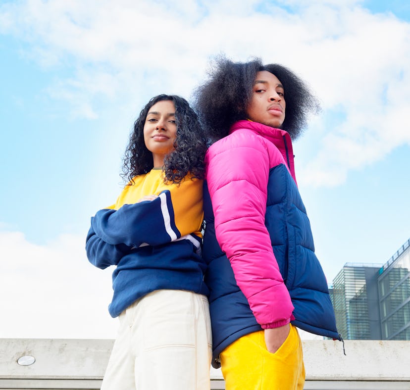 A young Cancer woman leaning against a Cancer man, wondering can Cancers fight?