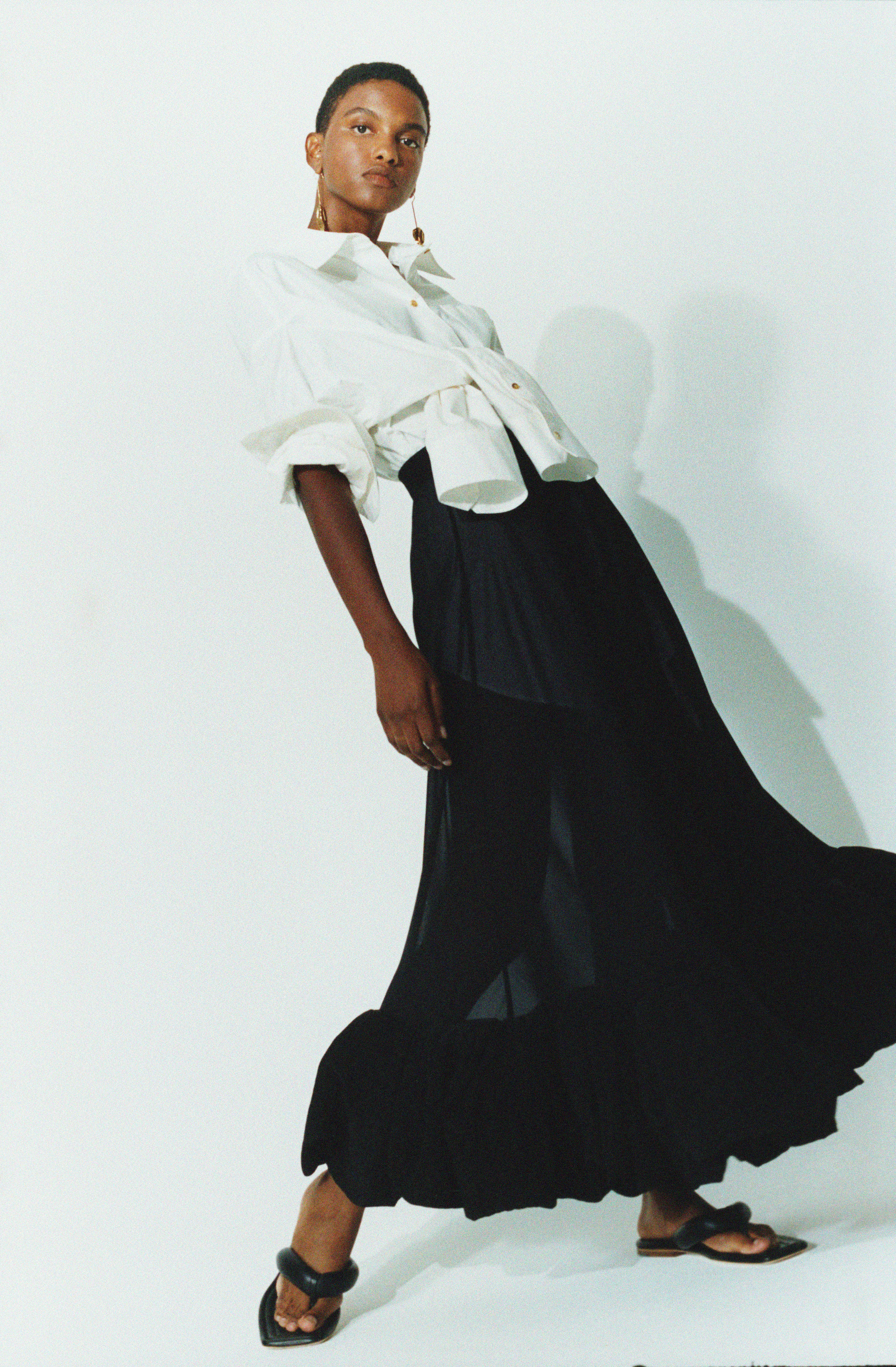 Model wearing Rejina Pyo Nella puffy sandals.