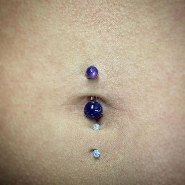 i got my belly pierced today, is it too deep??? i can't really see