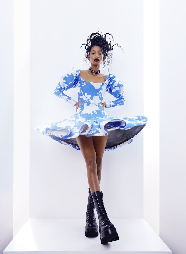 Willow Smith poses for NYLON's cover wearing a long-sleeved blue and white dress by Puppets Puppets.
