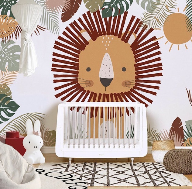 baby nursery with lion wallpaper