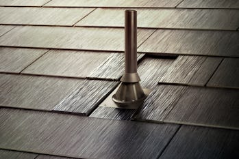 Tesla Solar Roof panels up close. The roof is designed to collect solar energy while still looking like regular roof tiles.