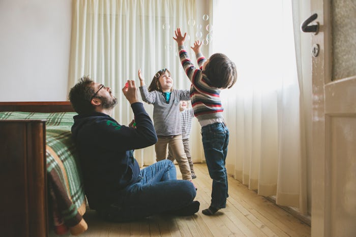 dad blowing bubbles with kids, best father's day gifts for dads in your life
