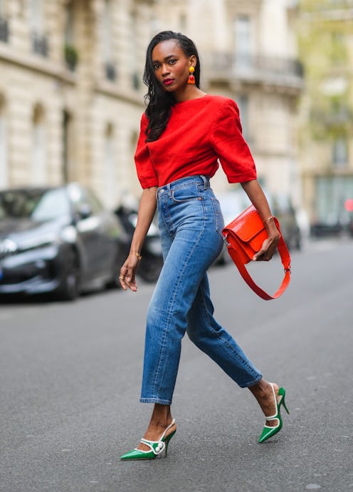 PARIS, FRANCE - APRIL 18: Emilie Joseph @in_fashionwetrust wears a red vintage linen power shoulder ...