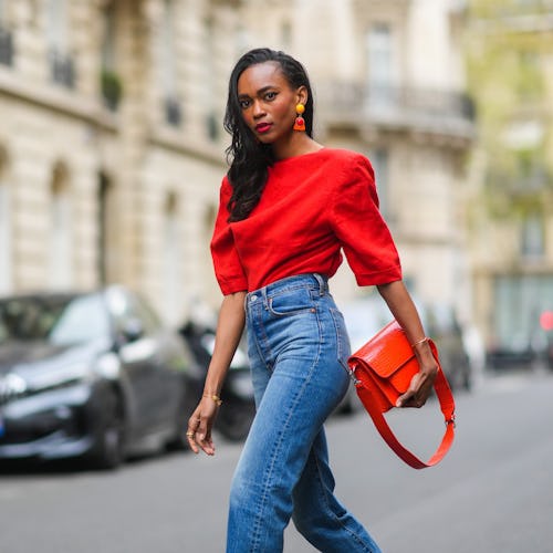 PARIS, FRANCE - APRIL 18: Emilie Joseph @in_fashionwetrust wears a red vintage linen power shoulder ...