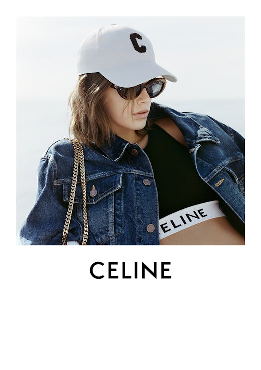 Kaia Gerber models items from Celine's French Summer capsule collection. 