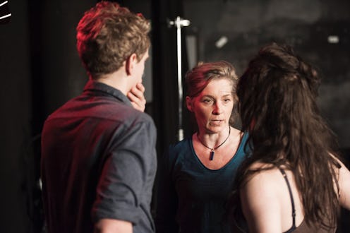 Intimacy Coordinator Ita O'Brien talking to two actors