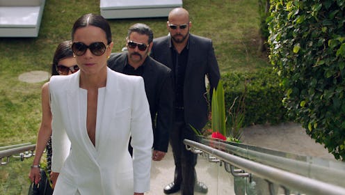 Alice Braga as Teresa Mendoza, Hemky Madera as Pote in 'Queen of the South' Season 5 via USA's press...