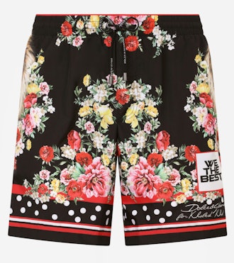 Dolce & Gabbana mid-length swim trunks with lion mix print