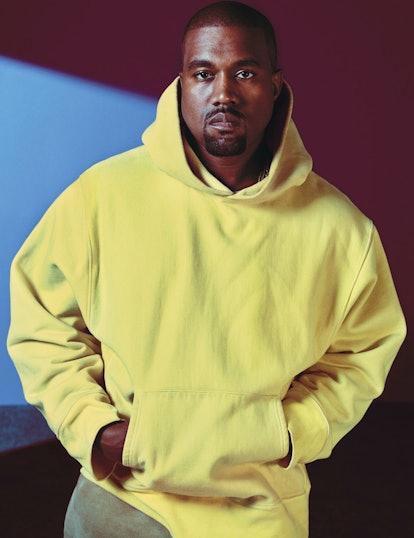 Kanye West wearing a yellow hoodie