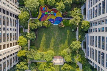 Aerial view of park between residential buildings