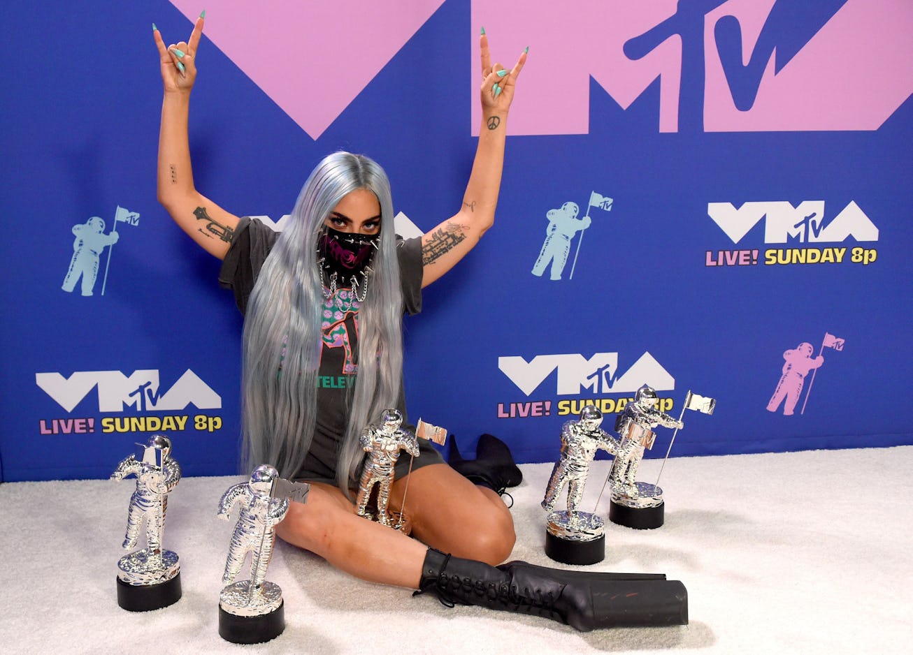 Lady Gaga with her VMA statues in 2020.