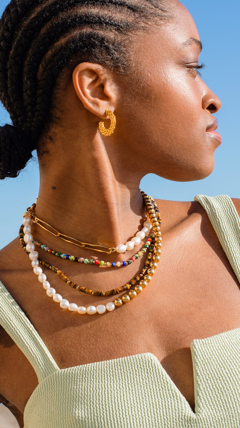Model wearing Missoma beaded necklace.