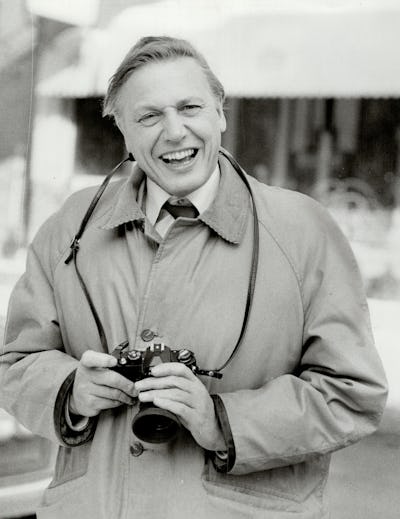 David Attenborough with a camera