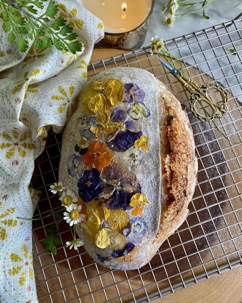 This bread loaf with edible flowers shows one of the biggest TikTok food trends.
