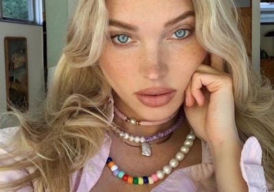 Elsa Hosk wearing beaded necklaces.