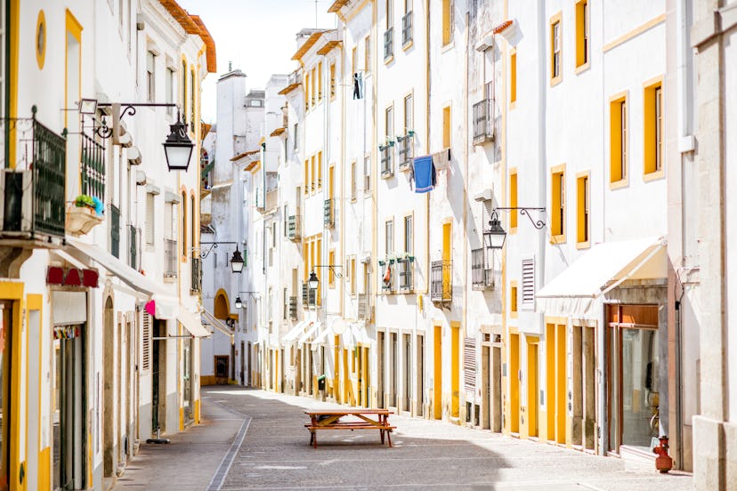 Street view of Evora, a city in Portugal that makes for a great under-the-radar travel destination.