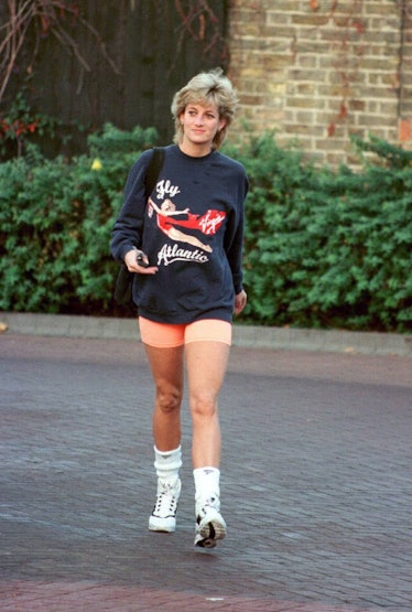 Princess Diana wearing orange bike shorts