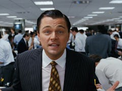 Leonardo DiCaprio looks at the camera in his role as Jordan Belfort, aka the wolf of wall street