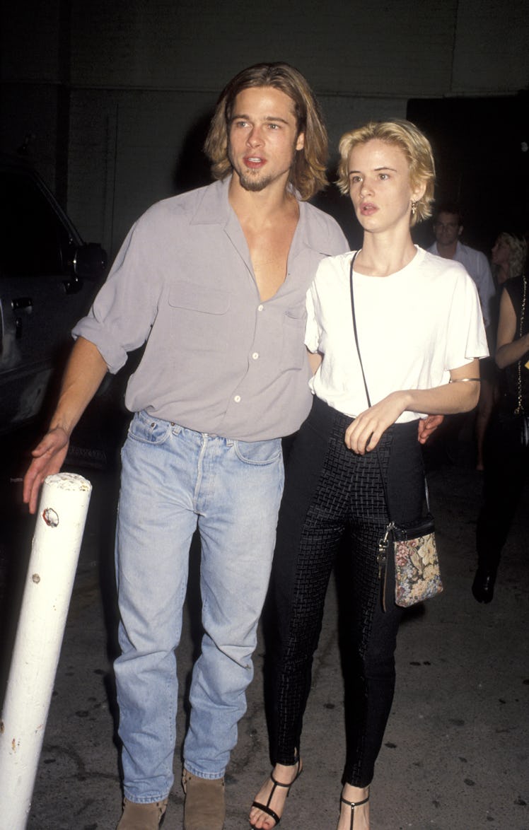 Brad Pitt hugging Juliette Lewis during 'The Last of the Mohicans Premiere'