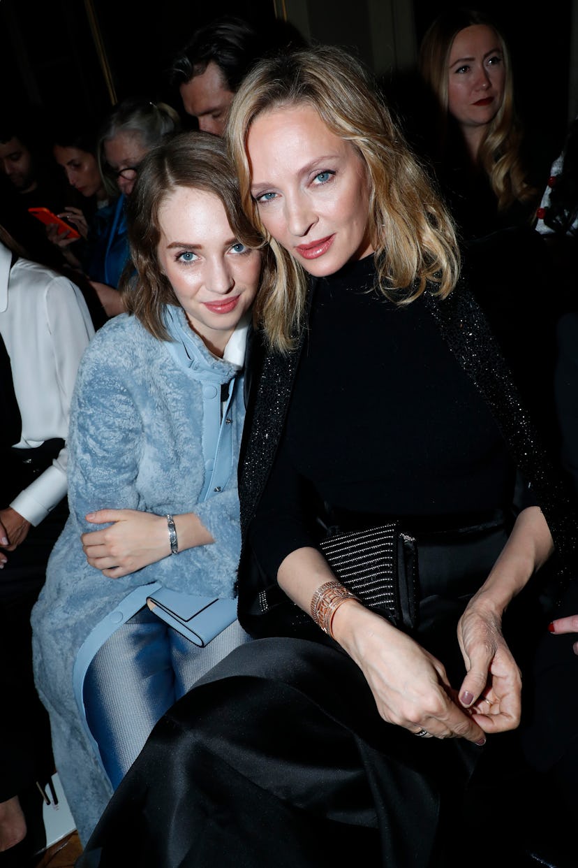 Maya Hawke and Uma Thurman in the front row of a 2019 Armani Privé show
