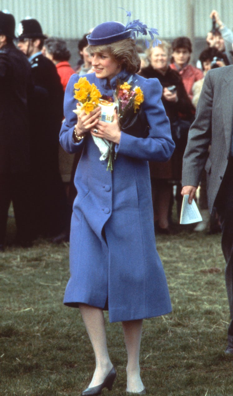 Princess Diana clutching a bouquet