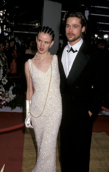 Brad Pitt and Juliette Lewis dressed up and hugged at the 64th Annual Academy Awards