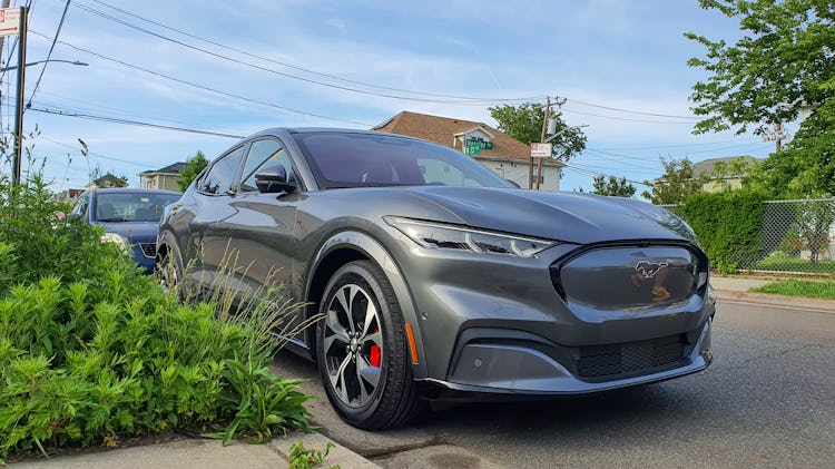 Ford Mustang Mach-E First Edition AWD Carbonized Gray parked