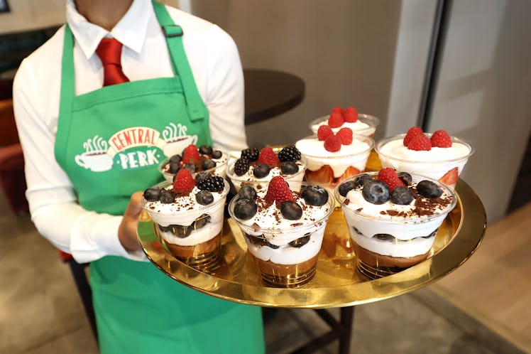 A Central Perk Café employee holds up a tray of Rachel's English trifle from 'Friends' available at ...