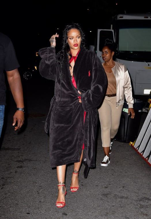 Rihanna in a robe. 