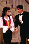 The Nanny's Fran Fine wearing a white pirate short, multi-colored striped vest and black pants, styl...