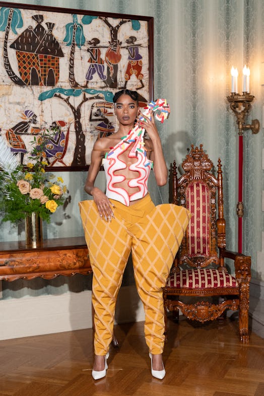A model in a look by Pyer Moss that makes her look like an ice cream cone 