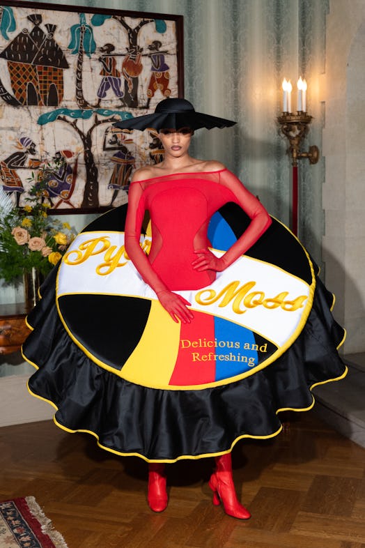 A model in a Pyer Moss's look with a skirt shaped like a soda lid 