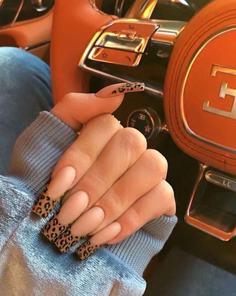 Kylie Jenner rocks a very '90s-era animal print manicure.
