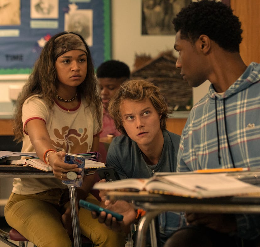 MADISON BAILEY as KIARA, RUDY PANKOW as JJ and JONATHAN DAVISS as POPE in Netflix's 'Outer Banks;