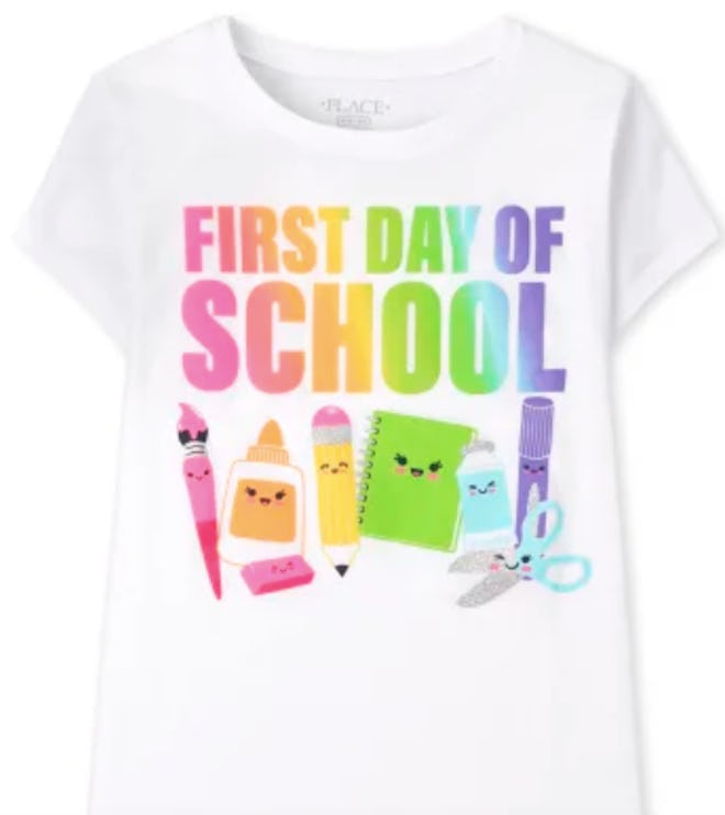 T-shirt in pastels that says "First Day of School"