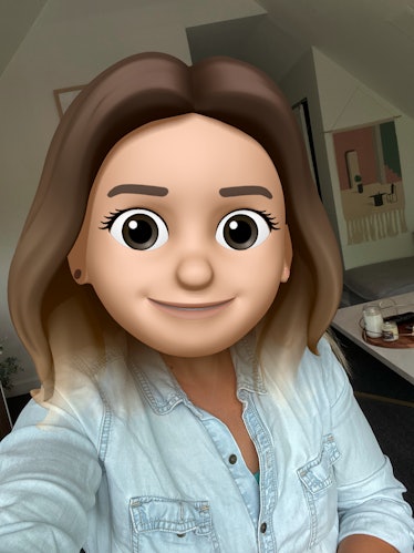 You can take a photo of your Memoji on your phone.