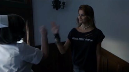 Kaia Gerber (Ruby) wearing Tate Langdon's "Normal People Scare Me" shirt from 'American Horror Story' in 'American Horror Stories'