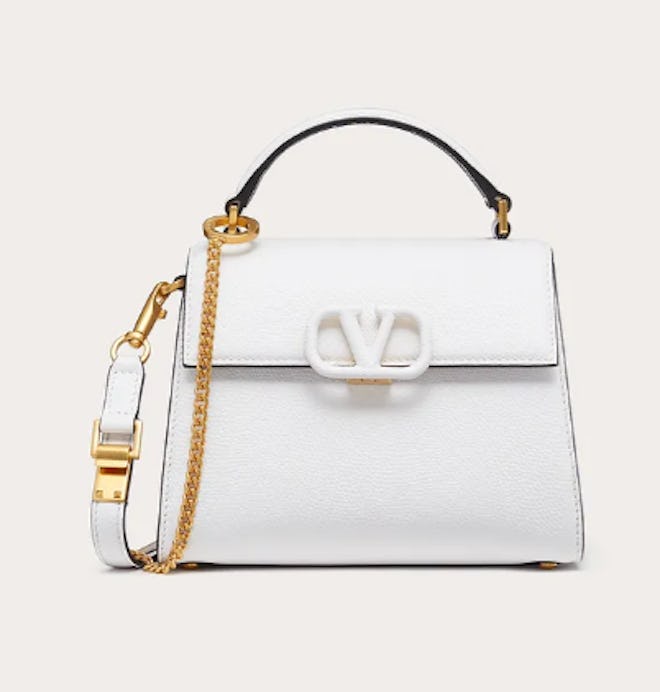 Valentino's Mini VSLING Grainy Calfskin bag in optic white. 