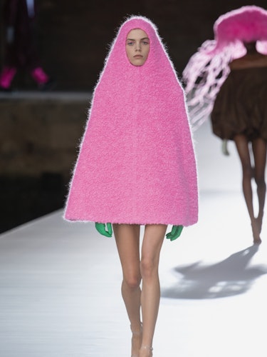 A model in a pink hooded dress at the Valentino Couture Fall 2021 Couture