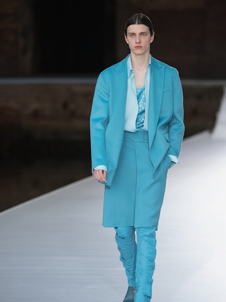 A model in a blue suit and shirt at the Valentino Couture Fall 2021 Couture