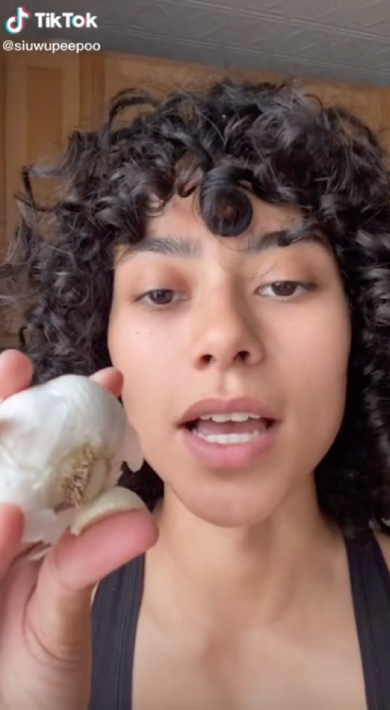 A viral TikTok showing the garlic sinus-clearing trend. Doctors say the garlic hack on TikTok doesn'...