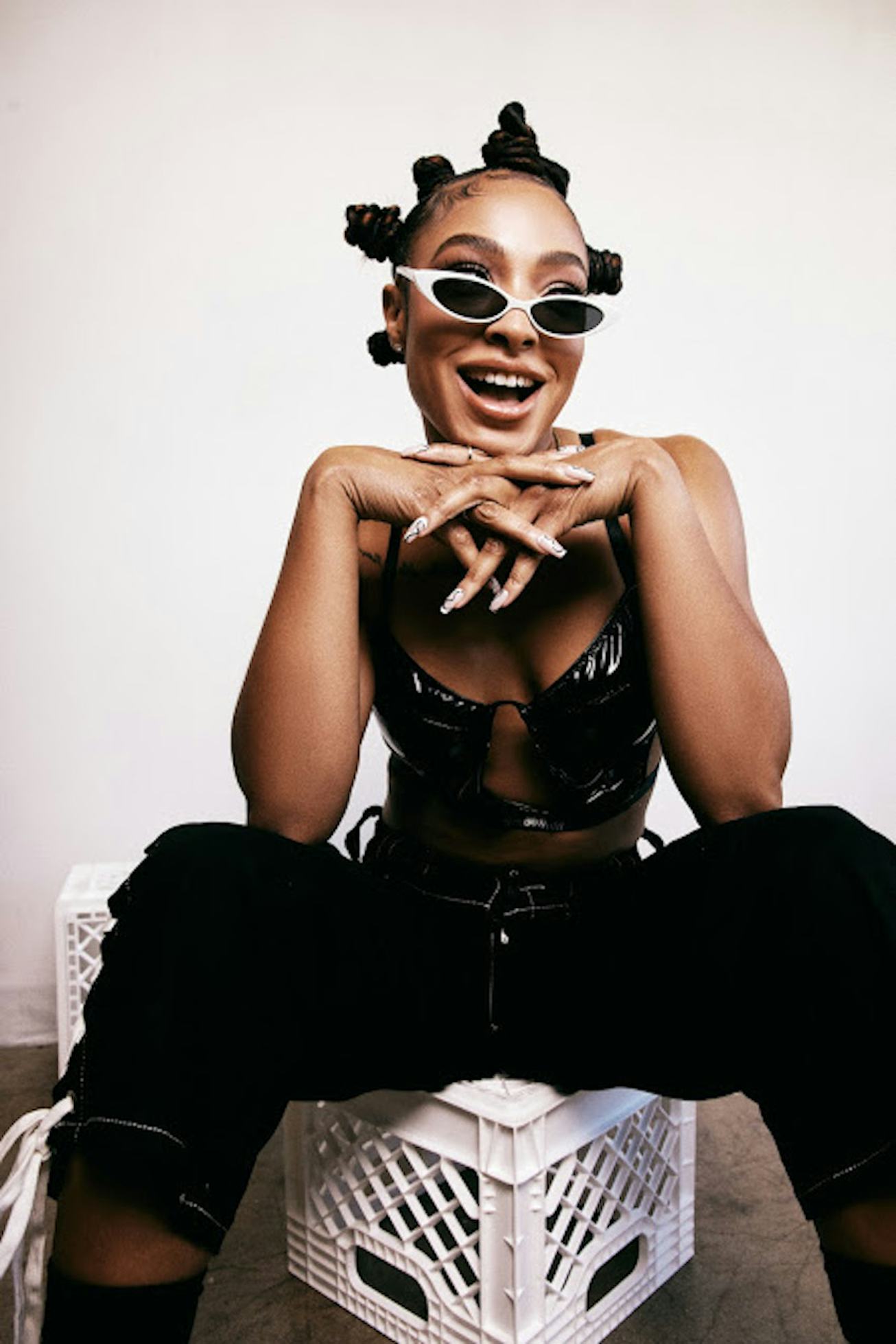 HoneyLuv curated the looks for her video with Dolls Kill shoes and clothes.