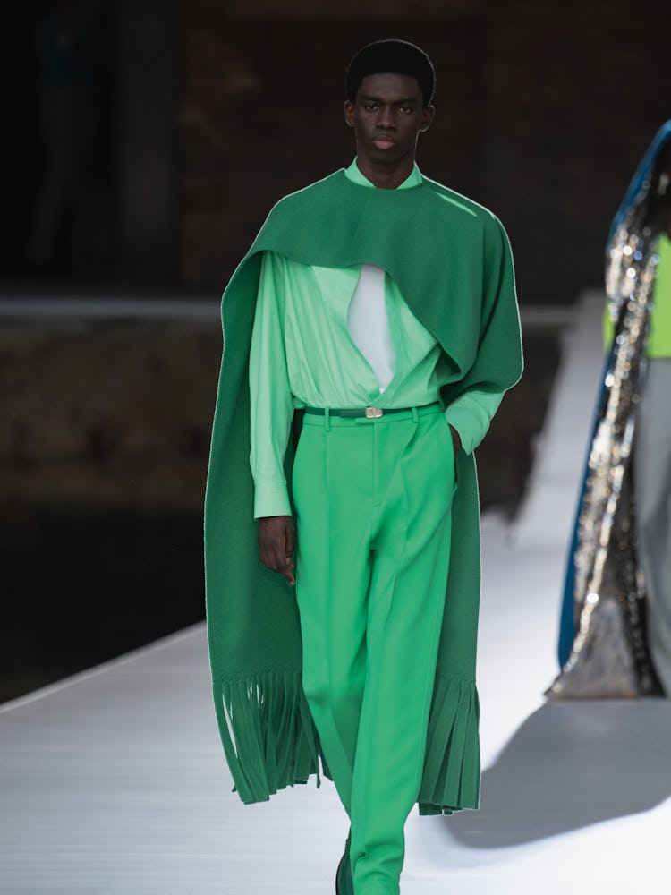 A model in a full green outfit at the Valentino Couture Fall 2021 Couture