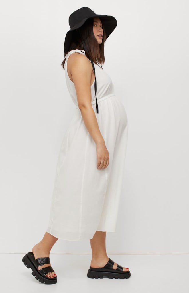 pregnant woman in white maternity dress