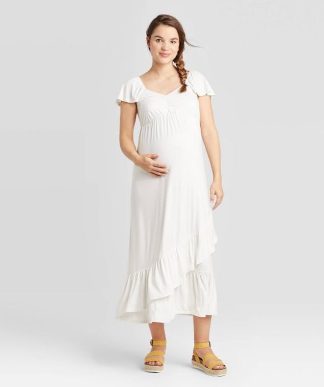 pregnant woman in white maternity dress