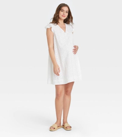 pregnant woman in white maternity dress