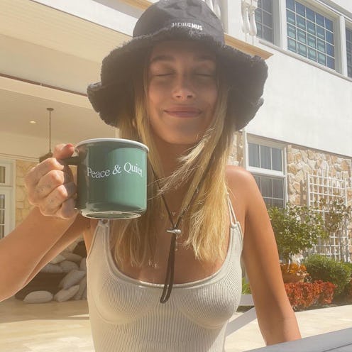 Hailey Bieber in a fringed bucket hat.